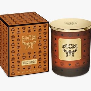MCM SCENTED CANDLE new, priced for 3